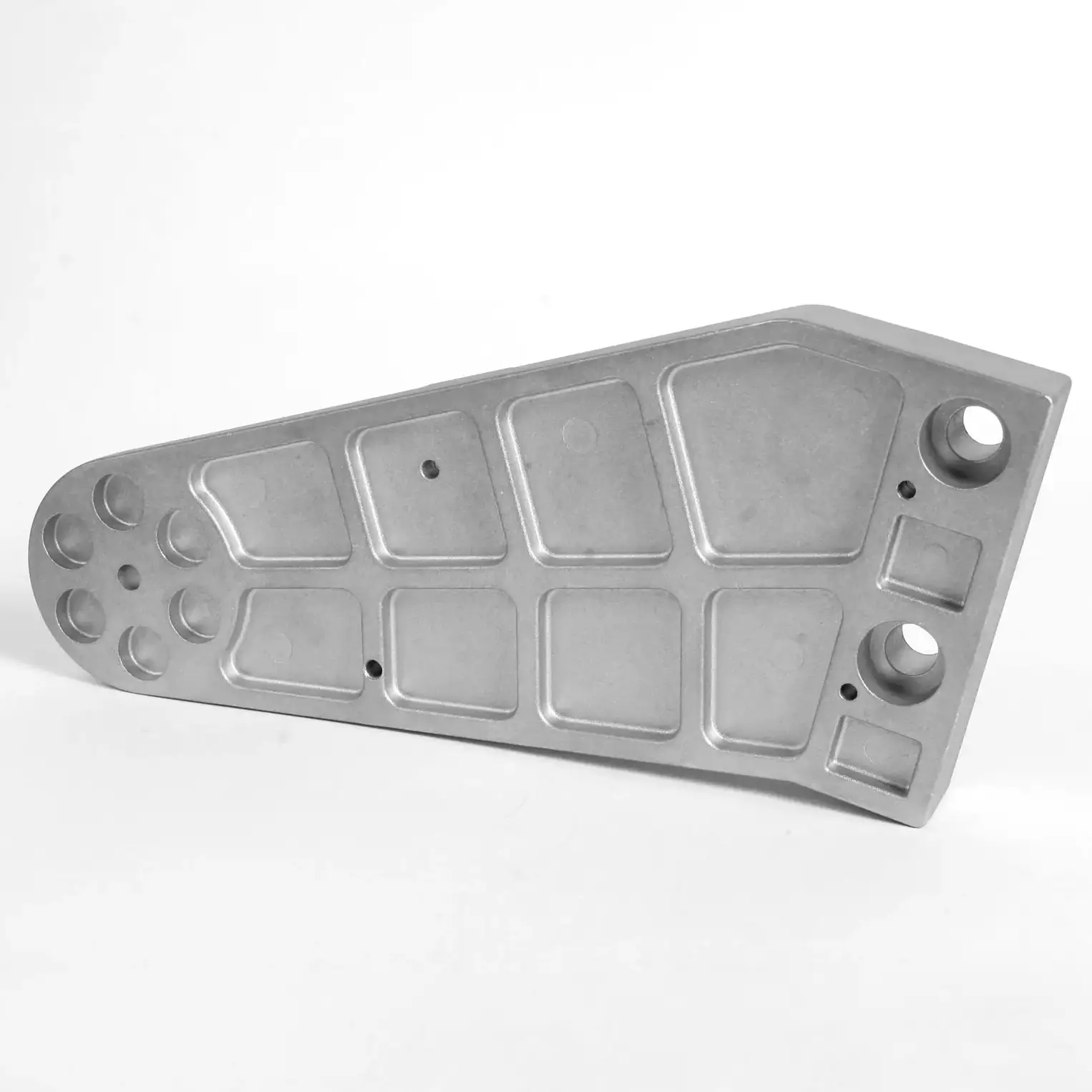 Piastra di supporto sagomata in lega di alluminio con fori di fissaggio e alleggerimenti a nido d'ape